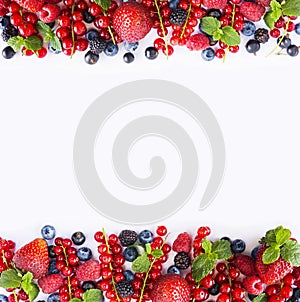 Black-blue and red fruits. Ripe red currants, strawberries, raspberries, blackberries, blueberries and blackcurrants on white back