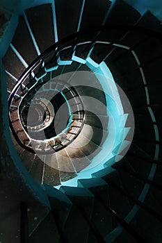 Black and blue spiralling staircase