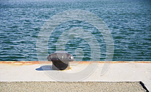 Black bollard for mooring