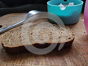 black borodino bread on a wooden background