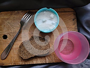 black borodino bread on a wooden background