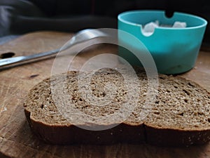 black borodino bread on a wooden background