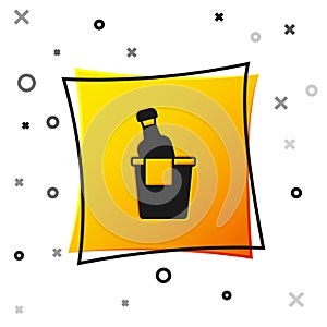 Black Bottle of champagne in an ice bucket icon isolated on white background. Yellow square button. Vector