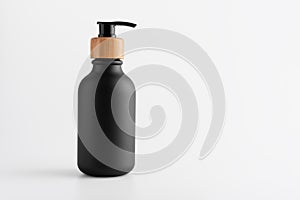 Black bottle with dispenser pump for liquid soap, gel, lotion, cream, shampoo and other cosmetics