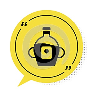 Black Bottle of maple syrup icon isolated on white background. Yellow speech bubble symbol. Vector