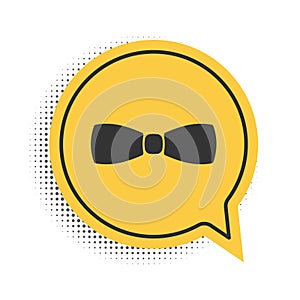 Black Bow tie icon isolated on white background. Yellow speech bubble symbol. Vector