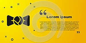 Black Bow tie icon isolated on yellow background. Vector