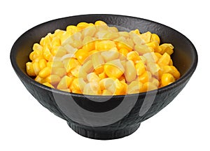 Black bowl with canned corn kernels isolated on white background