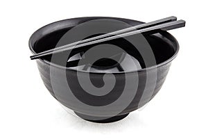 black bowl and chopsticks