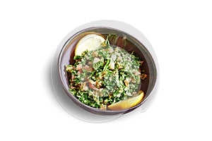 Black bowl with taboule apetizer isolated on white