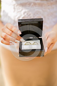 Black box for wedding rings with the newlyweds