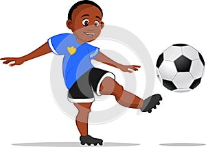 Black boy kicking soccer ball photo