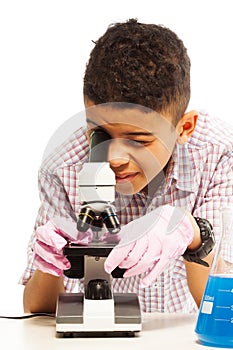 Black boy with microscope
