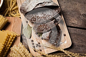 black bread on rustic wooden background