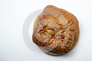 Black bread on a white background. Borodino bread. Homemade baking.