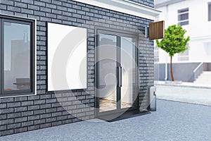 Black brick building exterior with poster