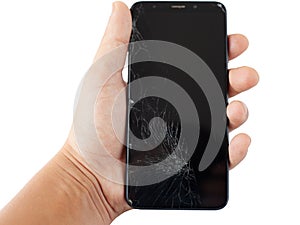 Black broken phone in hand on white background cracked touchscreen screen   isolate