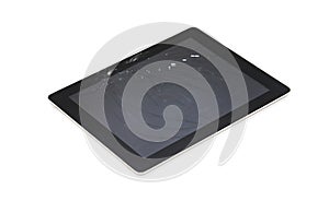 Black broken tablet on background