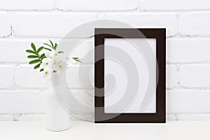 Black brown poster frame mockup with Tobacco flowers