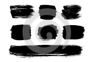 Black brush strokes isolated on white