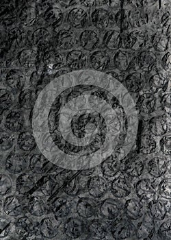 Black bubble wrap. texture or background