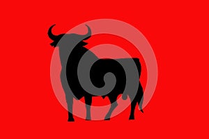 Black bull on red