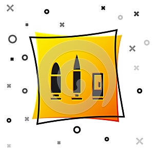 Black Bullet and cartridge icon isolated on white background. Yellow square button. Vector