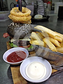 the black burger and chips