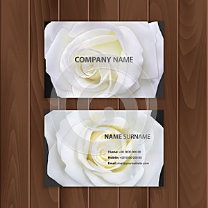 Black business card with realistic white rose, visit card on a wooden substrate, Vector EPS 10 illustration