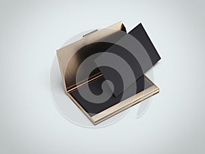 Black business cards with golden holder. 3d rendering