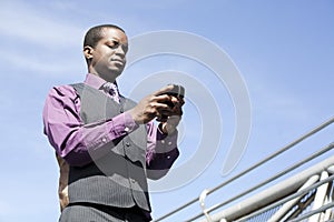 Black business man working with smart phone