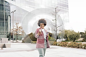 Black Business Woman Using Cellphone