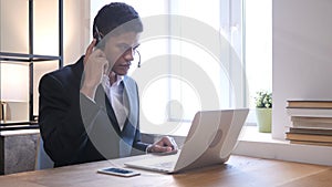 Black Businessman Attending Customer Call, Call Center