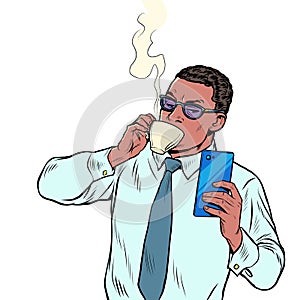 black businessman drinking morning coffee and reading smartphone, daily routine