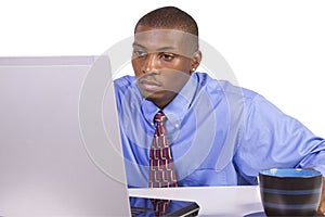 Black Businessman at His Desk Working