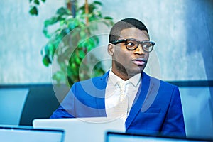 Black businessman working in office