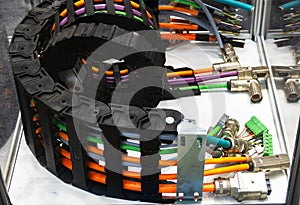 A black cable carrier, a drag chain, designed for industrial applications. photo