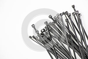 Black cable tie on the white background