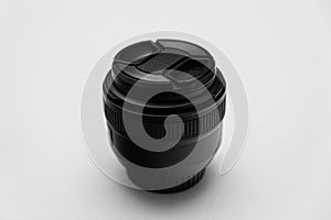 Black Camera Lens with Protective Cap on White