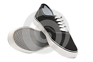 Black canvas sneakers, isolated over white