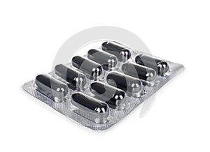 Black capsules in the package