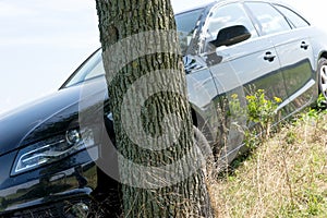 Black Car Accident hit the tree