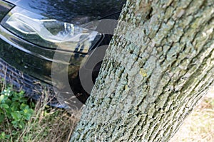 Black Car Accident hit the tree