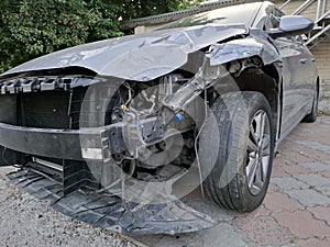 A black car after an accident. Passenger car in wreck condition