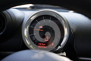 Black car dashboard with speed meter