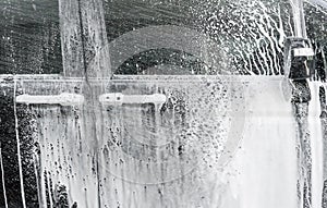 Ã Â¸ÂºBlack car wash with soap and foam
