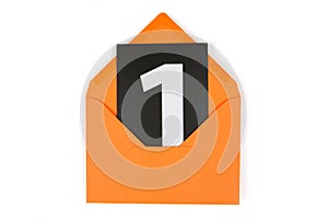 black card with a white number one in an orange paper envelope