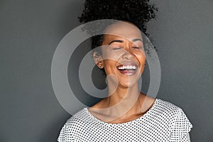 Black carefree woman laughing