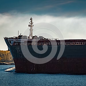 Black cargo ship`s bow