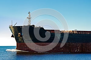 Black cargo ship`s bow